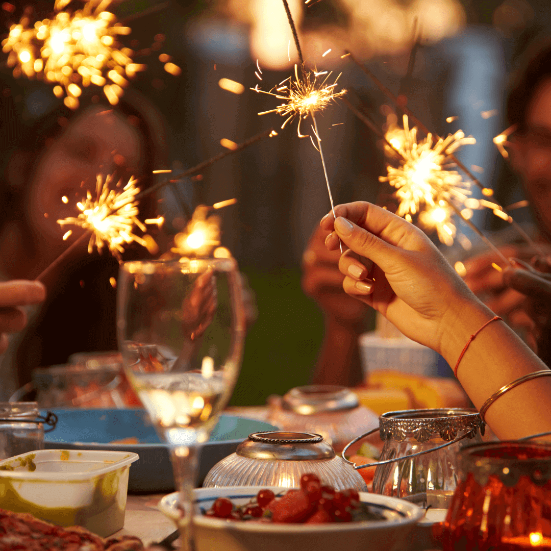Intimate Gathering with Sparkling Moments – Guests Enjoying Lit Sparklers at a Celebration | Celebration Sparklers
