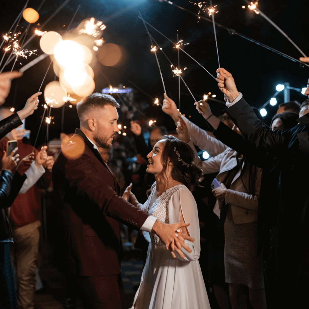 Married Couple Surrounded by 20" Wedding Sparklers – A Stunning Wedding Exit Moment | Celebration Sparklers